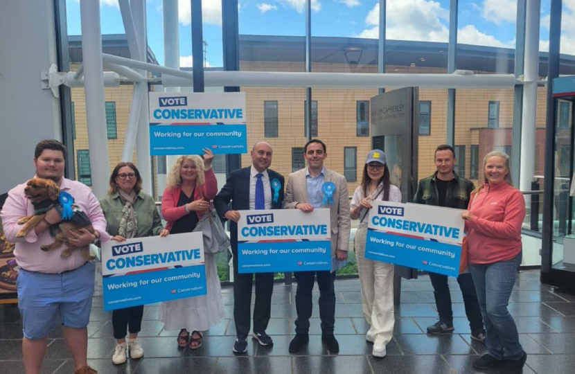 Pictured, Ed McGuinness, Andrew Griffith, and members of Surrey Heath Conservative Association