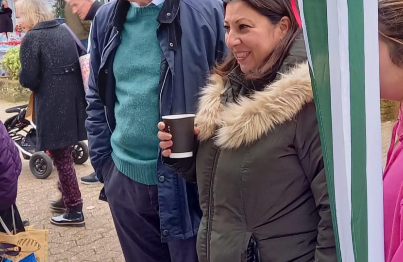 Pictured, Michael Gove with Christmas traders and Parish Cllr Katia Malcaus Cooper