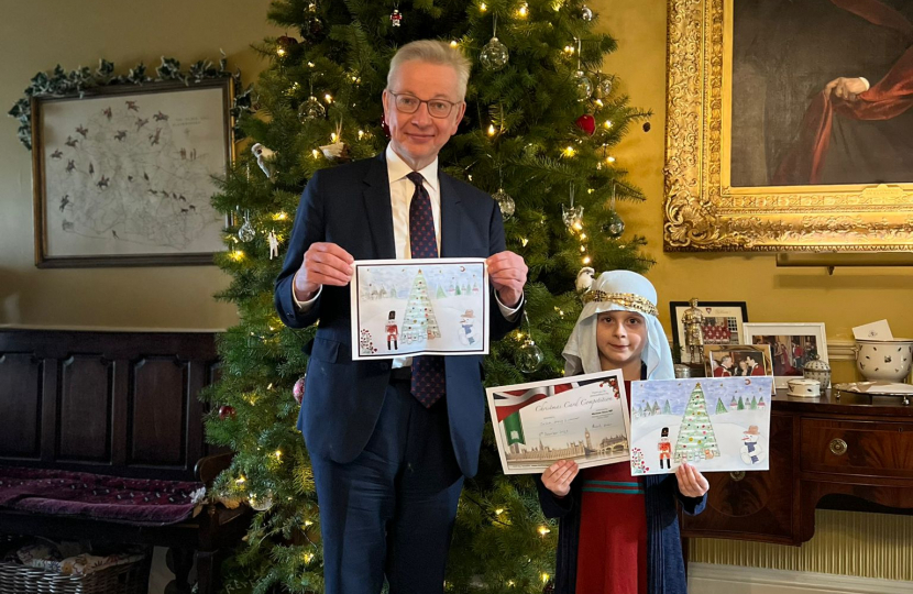 Michael Gove MP with Group 2 Winner, Sasha, at Hall Grove School, Bagshot