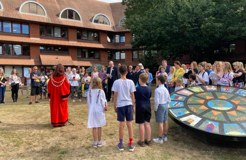 Pictured, the flag raising ceremony at Surrey Heath House to mark Ukrainian Independence Day