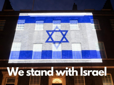 The Israeli flag illuminated on 10 Downing Street