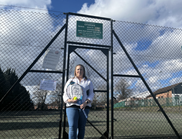 Pictured, Cllr. Rebecca Jennings-Evans at Frimley Green tennis courts