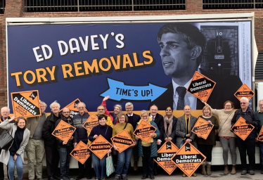 Pictured, Sir Ed Davey with the Lib Dem Parliamentary candidate for Surrey Heath, Alasdair Pinkerton