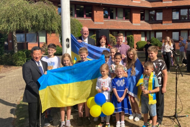 Pictured, the flag raising ceremony at Surrey Heath House to mark Ukrainian Independence Day